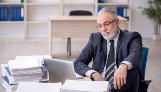 Old,Male,Employee,And,Too,Much,Work,At,Workplace Steuerberater Schweigepflicht